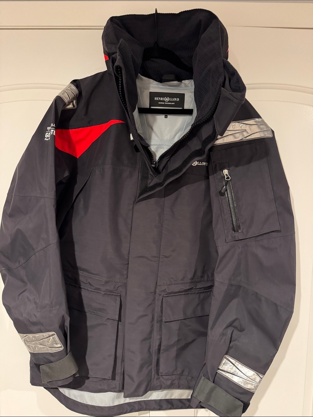 Henri Lloyd Black Jacket with Red Accents